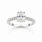 Such an on-trend engagement ring! Beautiful 1 carat oval cut diamond with diamond set shoulders, all in 18ct white gold.