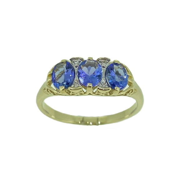 9ct Gold Tanzanite & Diamond London Bridge Ring. Tantalizing Tanzanite - one of the rarest and most beautiful gems, found only near the foot of Mount Kilimanjaro in Tanzania. 