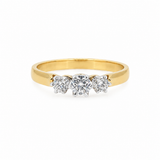 Three diamonds. One timeless design. Crafted in warm yellow gold with a brilliant three-stone setting, this classic ring is a beautiful symbol of yesterday, today and tomorrow. A piece you'll treasure for a lifetime.