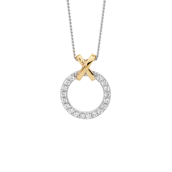 13mm circle pendant set with white cubic zirconias. Sterling silver with gold plating.