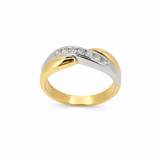 A two-tone wedding band ring featuring a polished yellow gold and white gold crossover design, with a channel-set row of clear round diamonds on the upper curve, shown against a plain white background.