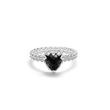 Sterling Silver mini claw ring with a black onyx stone set in the center, with a solid band and a tapered design.