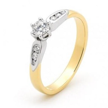 9ct Gold Diamond Solitaire with Channel Set Shoulder Diamonds
