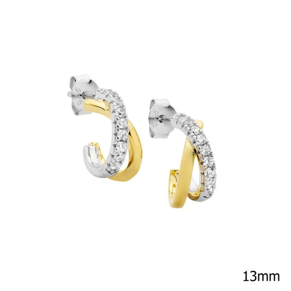 Bi-tone crossover hoop stud earrings with cubic zirconias, featuring a gold plated two-tone design.